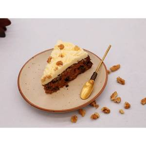 El Carrot And Pineapple Cake Slice With Cream Cheese Frosting