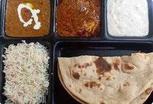 Chicken Curry(1pc Boneless), Dal Makhni, Rice, Raita & 2 Roti