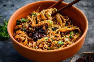 Schezwan Mushroom Fried Noodles