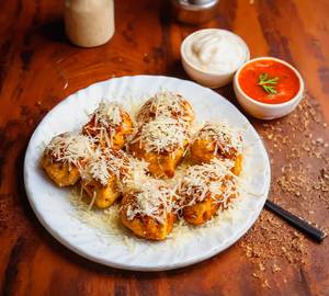Chicken Cheese Tossed Momos [8 Pieces]