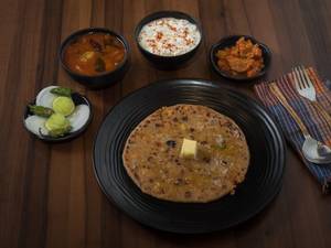 Onion Paratha With Curd And Pickle