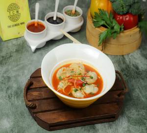Chicken Steam Momos In Chili Broth