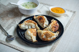 Pan fry chicken and cheese momo