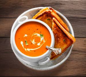 Cheese toast with tomato soup