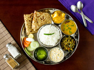 Premium Tawa Paratha Thali with Rice 