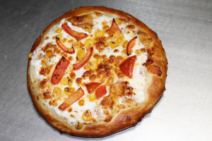 Tomato And Sweet Corn Pizza