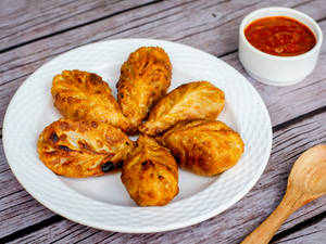 Veg Fried Momos [8 Pieces]