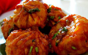 Chicken Momos Schezwan [8 Pieces]