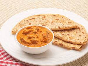 Butter Chicken (2 Pcs) + 1 Butter Naan/1 Laccha Paratha