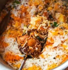 Veg. Biryani [exotic Veggies,paneer Tikka]