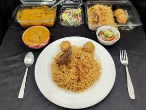 Mutton Dhansak + Caramalised Rice +4 Kababs + Kachumbar (serves One)