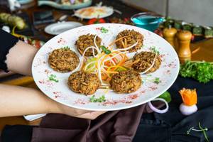 Chanajor Garam Tikki