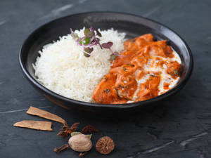Smokey Clove Butter Chicken  served With Rice