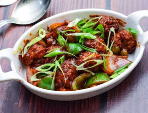 Veg Manchurian - Served with Sauce 