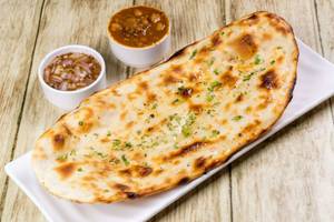 Amritsari Aloo Naan + Cholle + Dal Makhani 