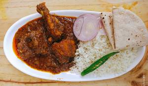 Chicken Thali ( 2 Piece Chicken, 2 Tawa Roti With Rice & Salad)