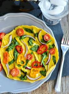 Cheesy Egg omlet with lots of veggies