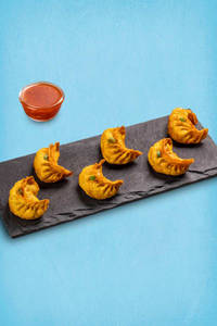 Fried Chicken Corn & Cheese Momos With Momo Chutney