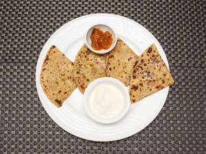Aloo Paratha Curd And Pickle