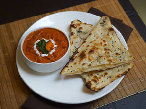 Paneer Butter Masala (Half) With 2 Butter Naan