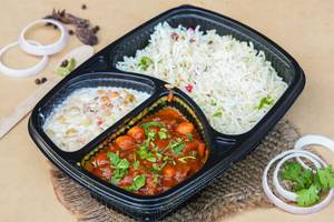 Chole With Jeera Rice And Boondi Raita