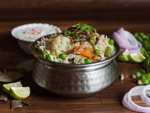 Veg. Biryani + Papad + Raita