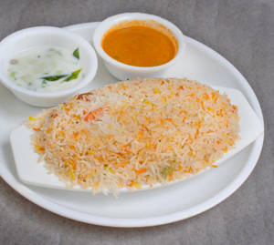 Veg Biryani (full) Served With Raita