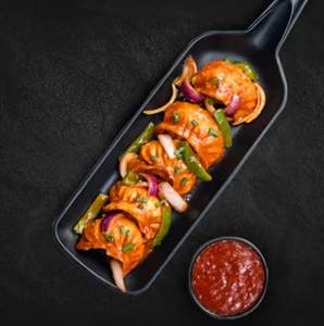 Chi. Wok Tossed Momos in Masala