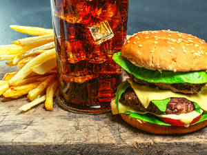 Premium Paneer Burger + French Fries + Coke (200 Ml)