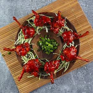 Classic Chicken Lollipop Tossed In Bbq Sauce