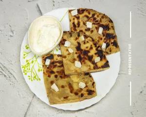 Paneer Paratha wish Curd