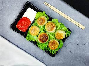 Veg Buttered Gyoza Momos