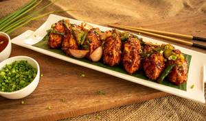 Chicken Stir Fried Chilli Momos (8 Pcs)