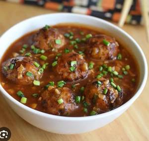 Veg Dumplings In Manchurian Sauce