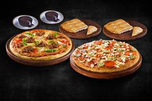 2 Non-Veg Medium Pizza + Free Garlic Bread & Choco Lava (Save Rs 510)