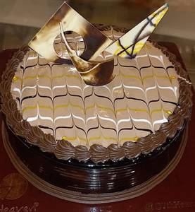 Chocolaty Caramel Indulgence Exotic Cake (eggless)