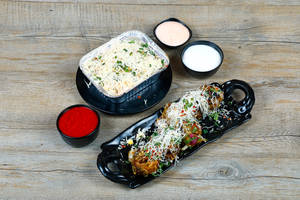 Tandoori Momos [3 Pieces] with Cheese Gravy Momos [4 Pieces]