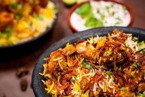 Murgh Hydrabadi Dum Biryani Combo For 2(biryani+12 Pieces Chicken 65  +2xfirni+kachoombar)