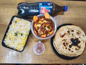 Veg Handi+4 Butter Roti+veg Biryani+2 Gulab Jamun+thums Up [500 Ml]