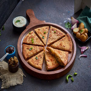 Stuffed Achari Aloo Paratha With Chutney Salad & Butter