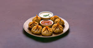 Veg Cheese Momos (fried)