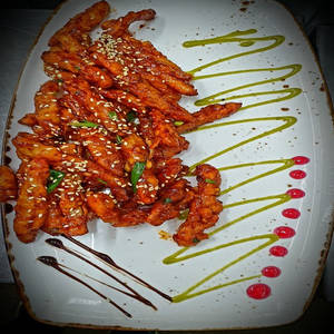 Sweet Spicy Potatoes Topped With Sesame Seed