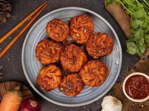Pan Fried Momos In Chilli Sauce [8 Pieces]