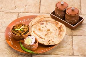 Chhole Served With Laccha Paratha 