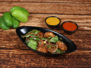 Veg Chilli Pan Fried Saucy Momos ( 8 Pieces )