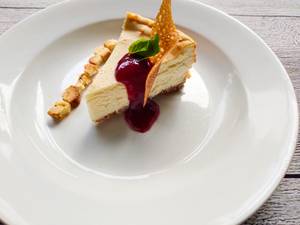 Baked Cheese Cake With Berry Compote (Slice)                                   
