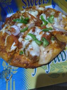 Grilled Paneer Pizza+ 125 Ml. Ice Cream Cup
