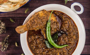 Chicken Chettinad + 2 Appam/ 2 Malabar Parotta