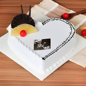 Eggless Heart Shaped Pineapple Cake