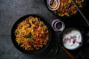 Veg Biryani With Raita, Pickle & Papad